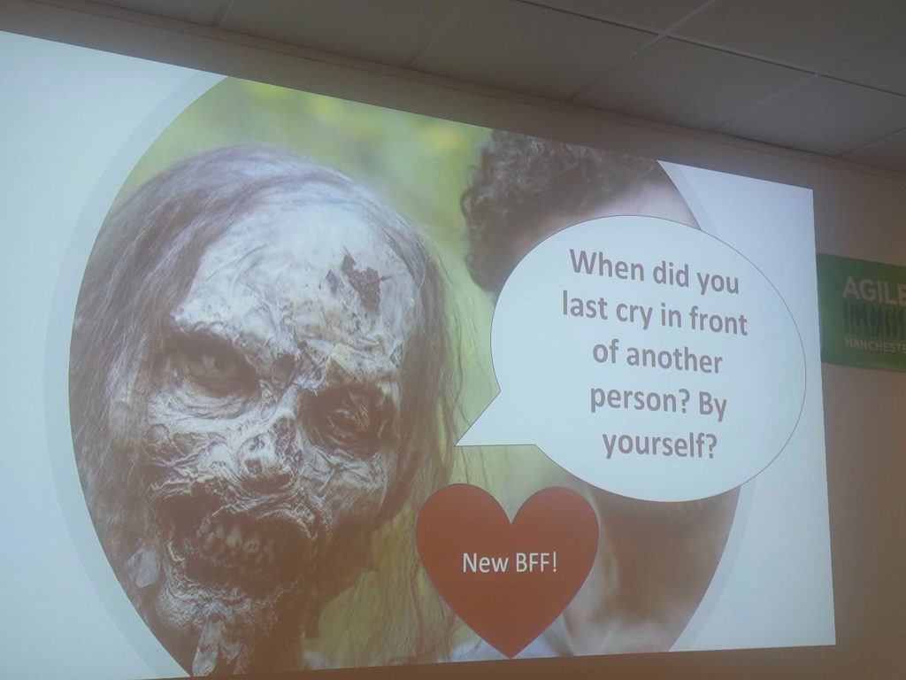 A zombie next to a person. Zombie'sspeech bubble asks:

"When did you last cry in front of another person? By yourself?"

A heart in between the two says "New BFF!"