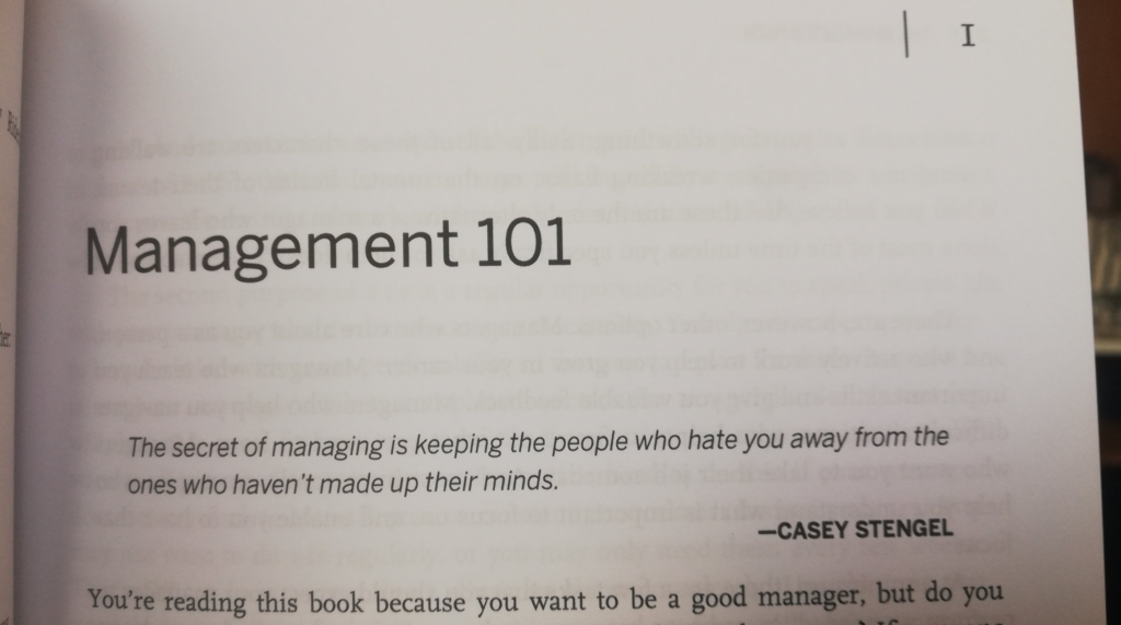 Photo of a book page. Heading is "Management 101". Then, a quote: "The secret of managing is keeping the people who hate you away from the ones who haven't made up their minds." - Casey Stengel.