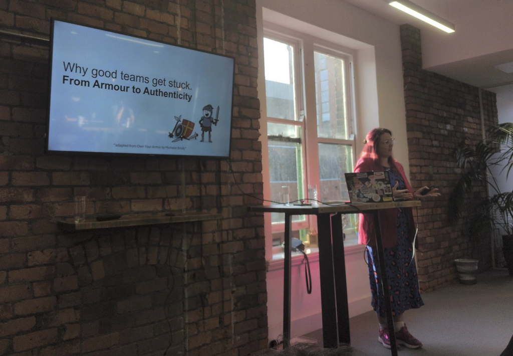 Hannah presenting in front of her title slide.